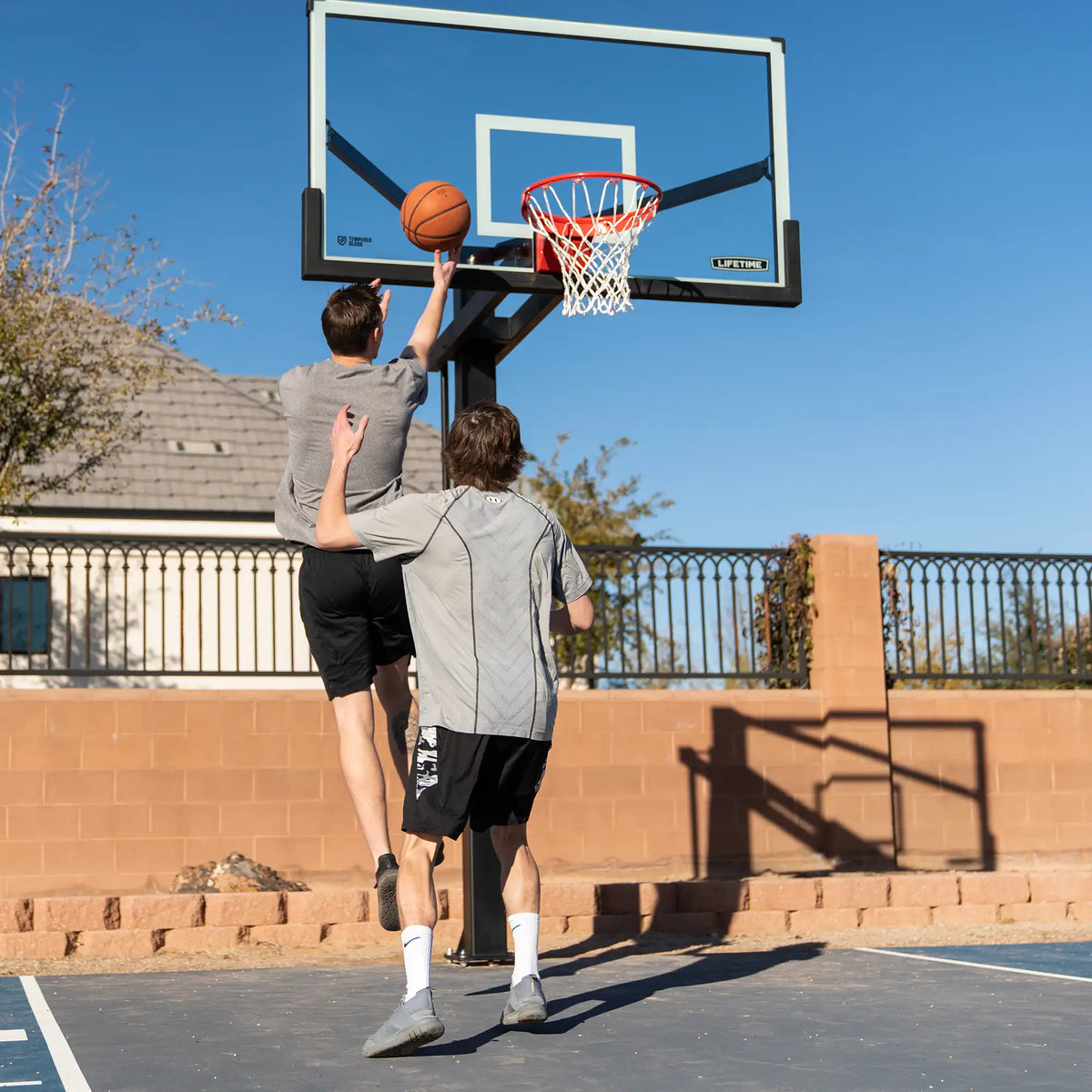 Lifetime Mammoth Bolt Down Basketball Hoop (72-Inch Tempered Glass)